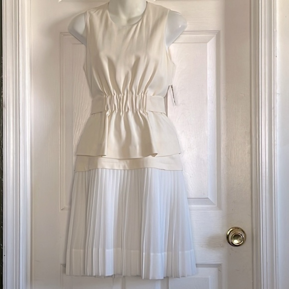 A.L.C dress in cream with pleated skirt, size 6.